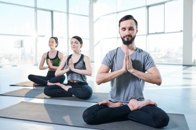 Sukhasana (cross-legged sitting pose)