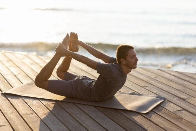 Dhanurasana or Bow pose